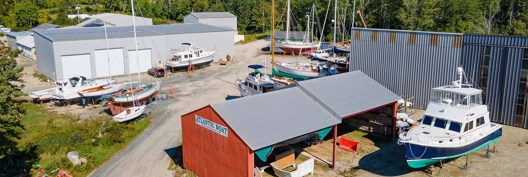 View of Atlantic Boatyard in the spring with boats ready to go in the water